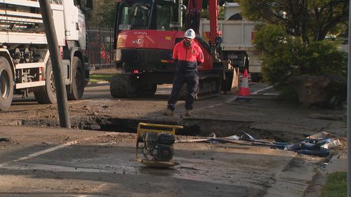 Sinkhole opens above M4 West Connex tunnel in Burwood.