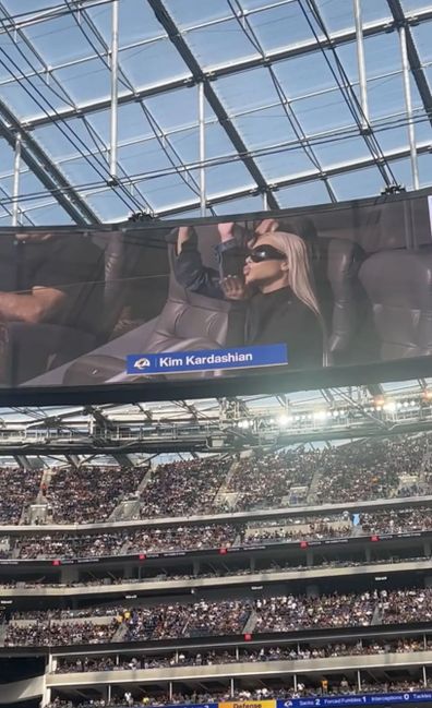 Kim Kardashian seemingly booed by crowd as she attends football game with son Saint.