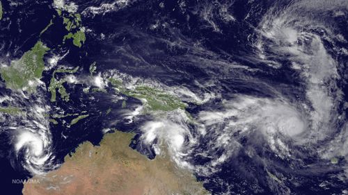 This image shows Tropical Cyclone Olwyn in the Indian Ocean heading south for landfall near Learmonth on the west coast of Australia, Tropical Cyclone Nathan meanders northeast of Cooktown, Queensland, Australia in the Coral Sea, Tropical Cyclone Pam tracks due south heading for the islands of Vanuatu in the southern Pacific Ocean and Tropical Depression 3 heads west-northwest towards Guam in the northern Pacific Ocean. (AAP)