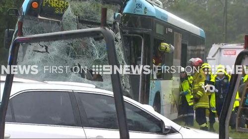 Fifteen people injured as garbage truck collides with bus in Sydney