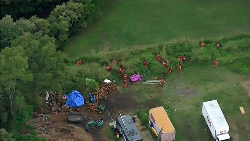 A crime scene has been set up in Brisbane's north, with SES crews currently combing the area.