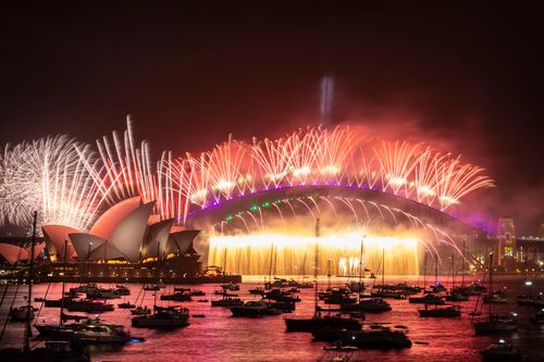 The midnight New Year's Eve fireworks on Sydney Harbour, viewed from Mrs Macquarie's Chair