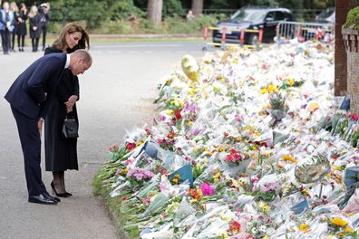 Prince William, Prince of Wales and Catherine, Princess of Wales view floral tributes at Sandringham on September 15, 2022 in King's Lynn, England.  