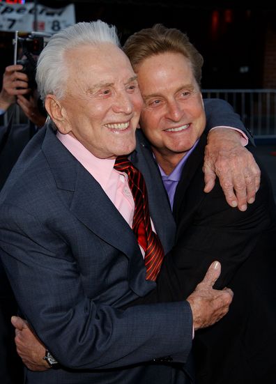 Kirk Douglas & Michael Douglas during "It Runs In The Family" Premiere at Mann Bruin Theatre in Westwood, California, United States in 2003.