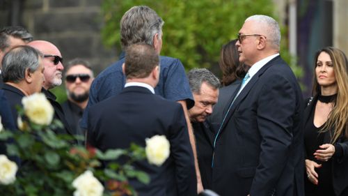 Melbourne identity Mick Gatto farewells his son, Justin.