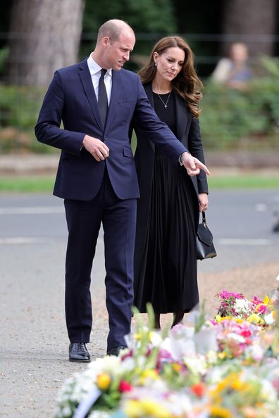 Prince William, Prince of Wales and Catherine, Princess of Wales view floral tributes at Sandringham on September 15, 2022 in King's Lynn, England.