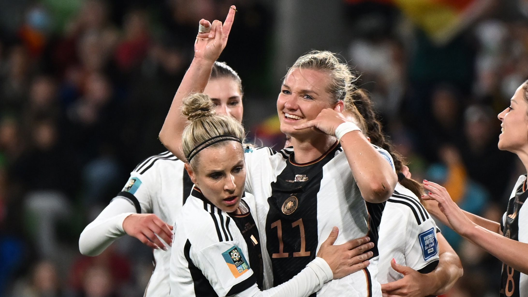 dpatop - 24 July 2023, Australia, Melbourne: Soccer, Women: World Cup, Germany - Morocco, Preliminary Round, Group H, Matchday 1, Melbourne Rectangular Stadium: Germany&#x27;s Alexandra Popp (center) celebrates the 2:0 with her teammates. Photo: Sebastian Christoph Gollnow/dpa (Photo by Sebastian Christoph Gollnow/picture alliance via Getty Images)