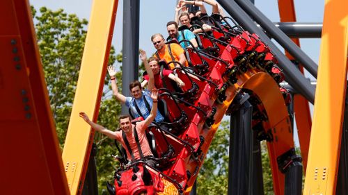 These US coaster enthusiasts — "daredevils" if you will — are willing riders on the Jersey Devil Coaster, which debuted to the public on Sunday, June 13, at Six Flags Great Adventure in central New Jersey.