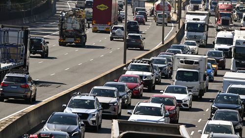 Cars and trucks, inbound traffic on the Monash freeway M1. 7th March 2025, 
