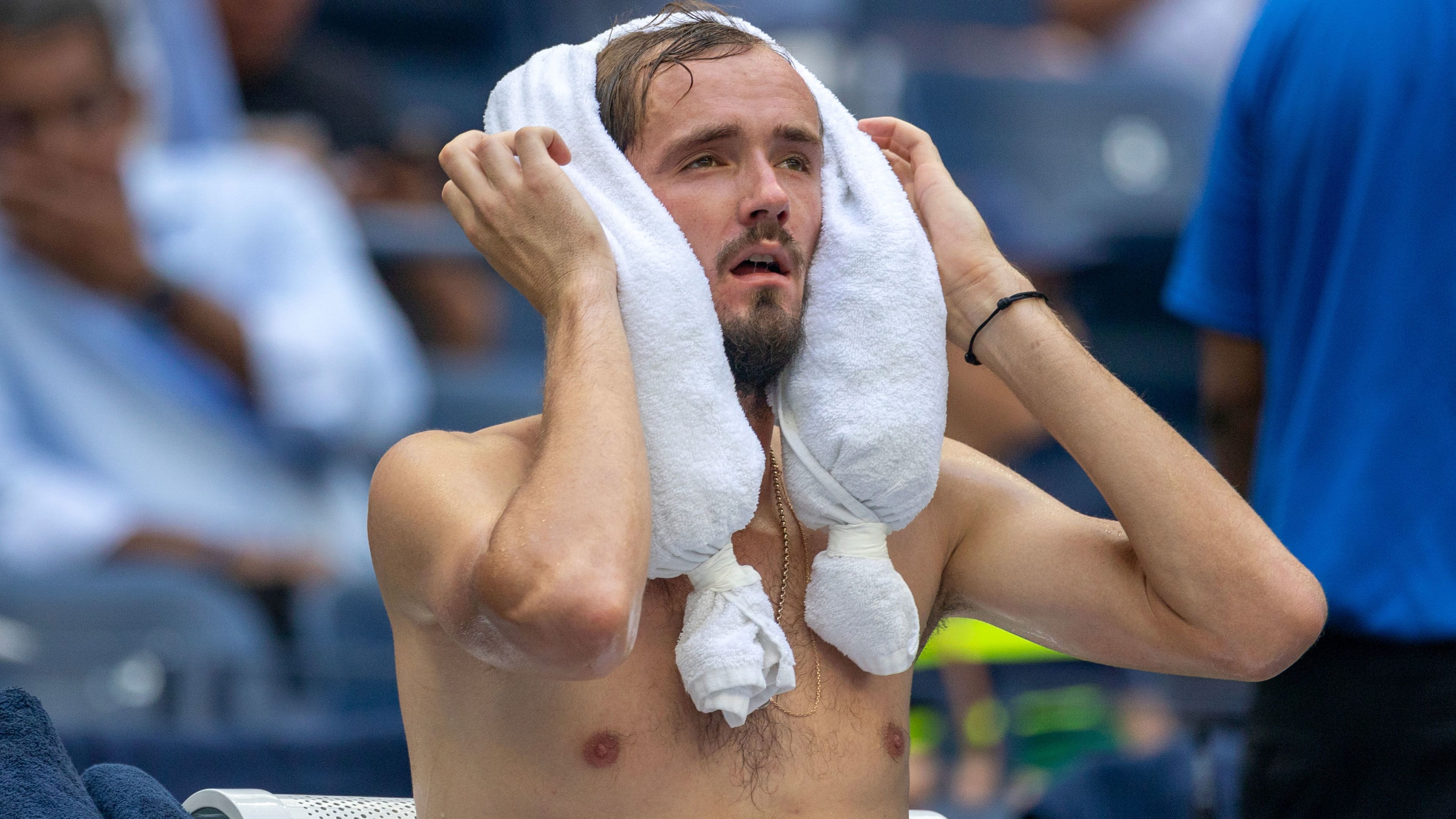 Daniil Medvedev cools off with an ice pack between sets two and three during his match against Andrey Rublev in the US Open quarter-final. 
