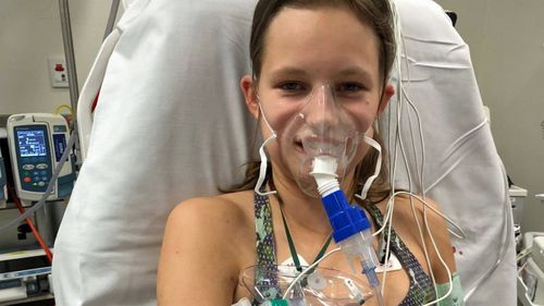 Madison Fanshawe in hospital after her fourth allergic reaction last year.
