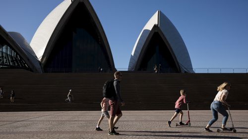 Generic. People enjoy the warmer than usual spring weather at the Opera House in Circular Quay in Sydney on September 12, 2020. 