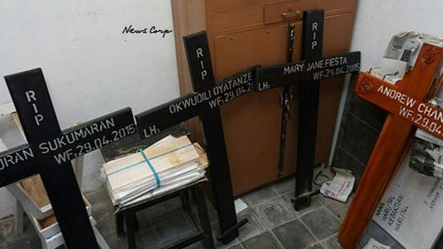 Crosses revealing what is believed to be the date of execution for the death row prisoners. (9NEWS)