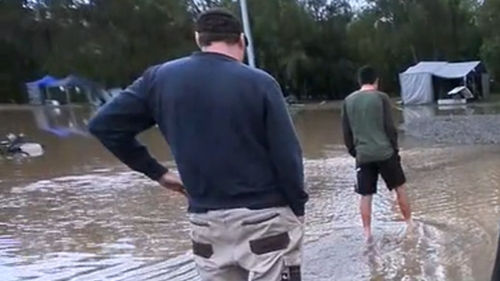 A packed campsite in Helensvale began flooding in the late hours of last night, prompting a frantic evacuation.