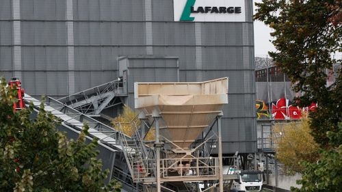 Explosives found under cement trucks in Paris