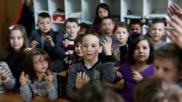 Three months on the class knows basic sign language. (AP Photo/Amel Emric)