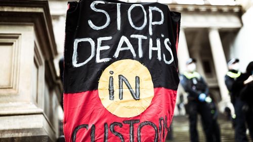 Protesters march in Bourke Street in Melbourne, Australia. Events across Australia have been organised in solidarity with protests in the United States following the killing of an unarmed black man George Floyd.