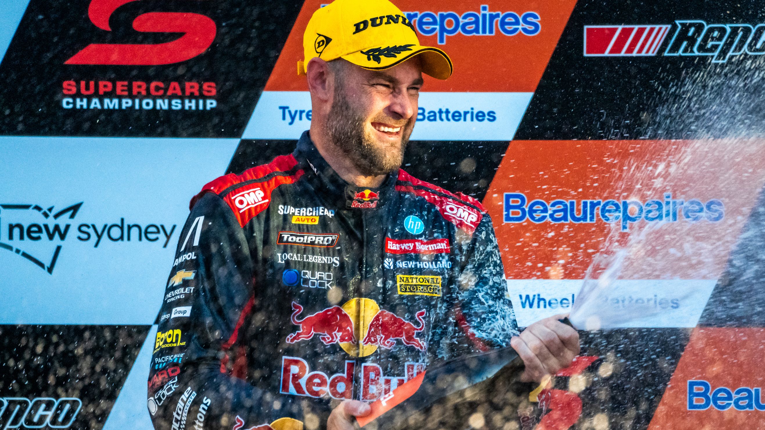Shane van Gisbergen celebrates victory in the Supercars Championship.