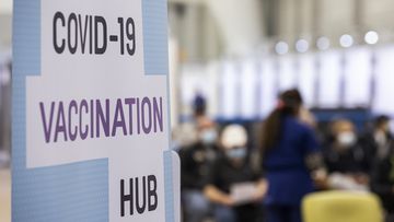 MELBOURNE, AUSTRALIA - JULY 20: People wait for 15 minutes after receiving a COVID-19 vaccine at the Melbourne Showgrounds COVID-19 Vaccination Centre on July 20, 2021 in Melbourne, Australia. Premier Daniel Andrews has announced a 7 day extension on the lockdown in Victoria, as the state continues to record new community COVID-19 cases and work to stop the spread of the highly infectious delta coronavirus strain in the community. (Photo by Daniel Pockett/Getty Images)