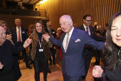Britain's King Charles III visits a JW3 Jewish community centre in London, Friday Dec. 16, 2022, as the Jewish community prepares to celebrate Chanukah. JW3 is a Jewish community centre that is open to all faiths and acts as a hub for the arts, culture, social action and learning in North London. (Ian Vogler/Pool via AP)