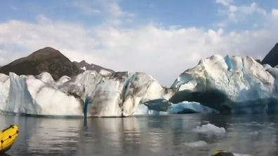 The two kayakers were enjoying a day of adventure. 