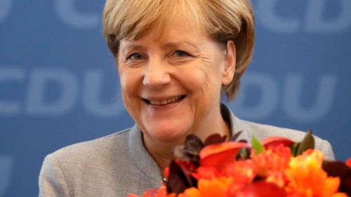 Merkel achieves coalition deal