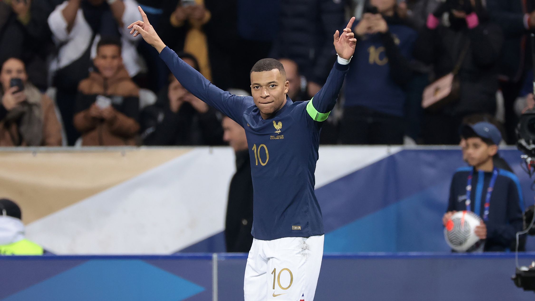 Kylian Mbappe celebrates after scoring a spectacular long-range goal to complete his hat-trick during the Euro 2024 European qualifier match between France and Gibraltar.