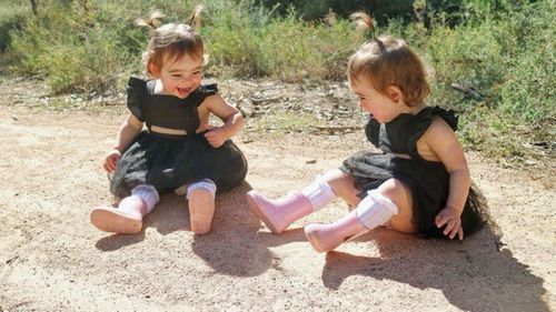 Ava and Isla pictured on the same bushwalk, were oblivious to the snake, Ms Carter said.  