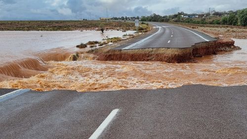The road to Woomera and Roxby Downs was washed away in heavy rain. 