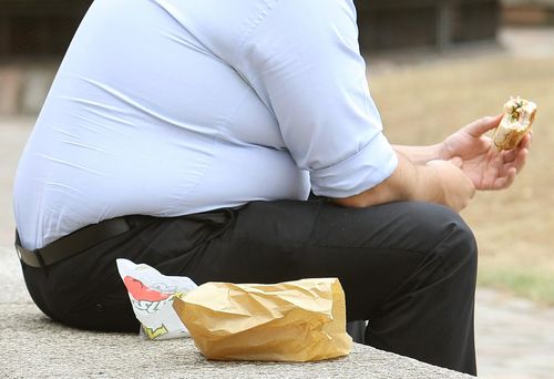 about 60 percent of the Australian population is obese or overweight. (AAP)