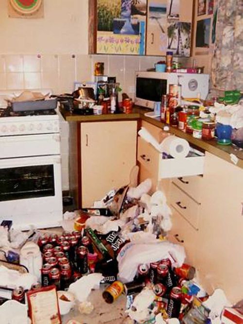 This photo shows the kitchen in the home, strewn with energy drinks. (Supplied)