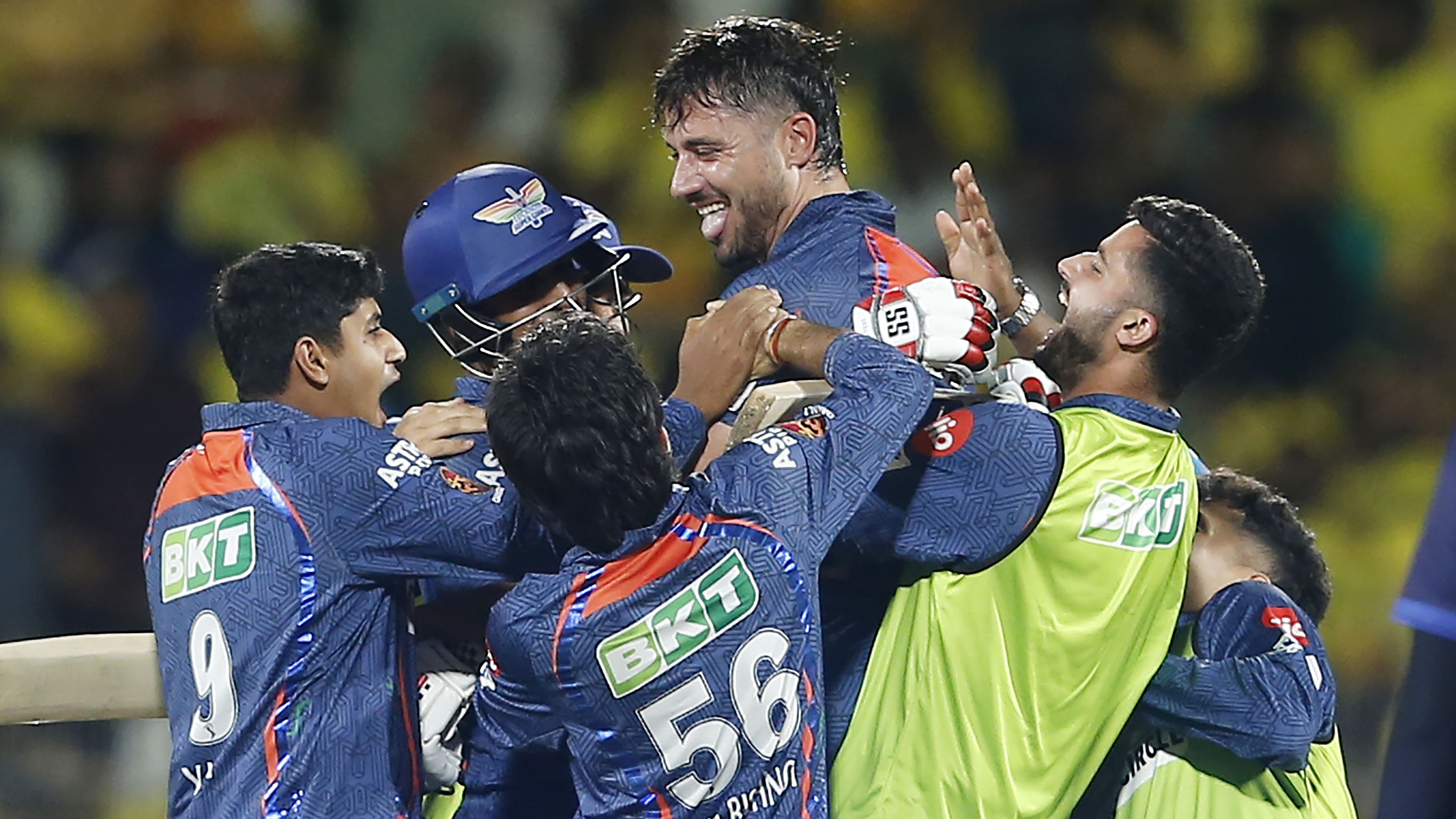 Lucknow Super Giants&#x27; team members lift Marcus Stoinis as they celebrate their win in the Indian Premier League over the Chennai Super Kings.