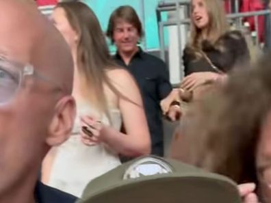 Cruise, 63, and De Armas, 37, have been spotted together several times this year, but they have not publicly confirmed that they are dating, nor have they shown any PDA.﻿That is, until a concertgoer accidentally caught the pair holding hands in the background of a video he posted to Instagram. 