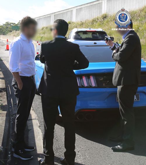 This is the moment police stopped and arrested Arsalan Khawaja in Burnett Street, Parramatta, today.