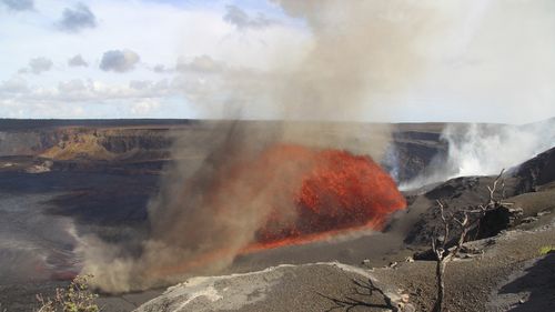 In this image released by the U.S. Geological Survey, the Kilauea volcano spews lava on Friday, Aug. 22, 2025, in Hawaii Volcanoes National Park, Hawaii. (M. Zoeller/U.S. Geological Survey via AP)