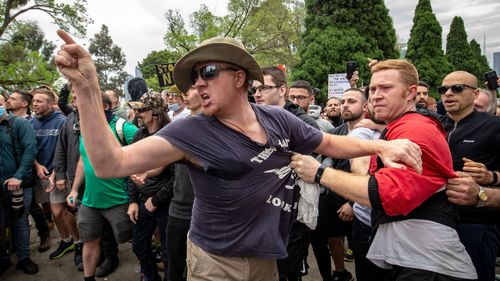 Protesters and members of Victoria Police clash on October 23, 2020 in Melbourne, Australia