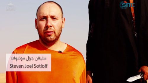 A still from the new video purporting to show Steven Sotloff's execution at the hands of an IS militant. 