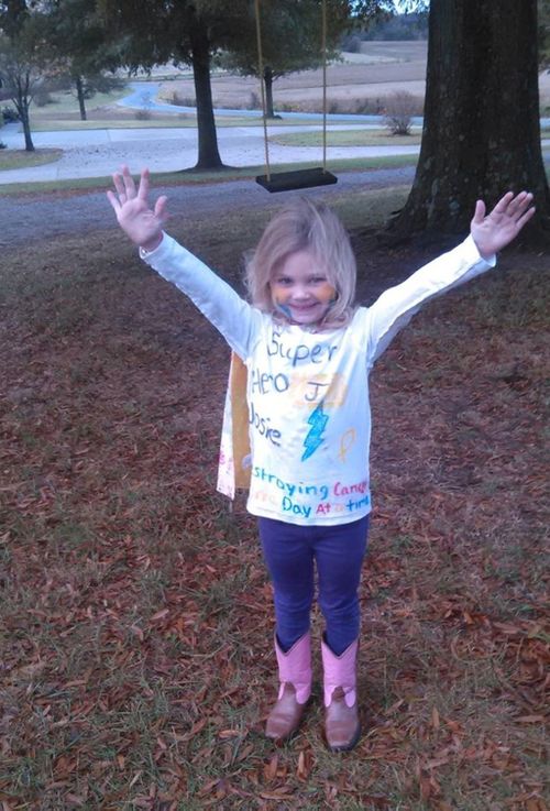 Four-year-old battling cancer dresses as herself on school superhero day