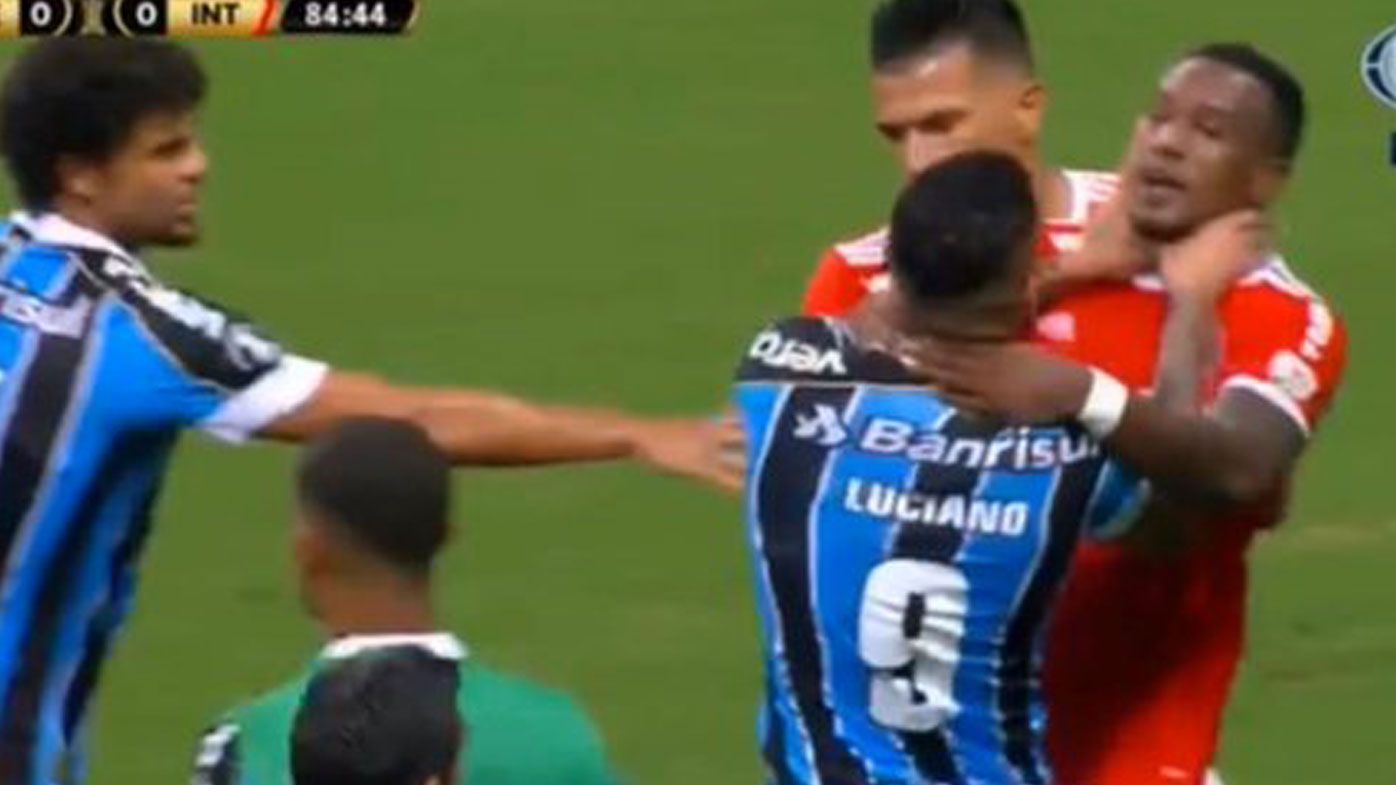 Wild all-in brawl in Copa Libertadores derby leads to eight players being red-carded