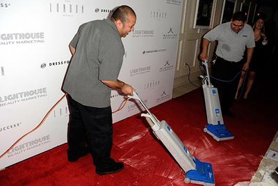 Cleaners vacuum up the aftermath.<br/><br/><a href="http://news.ninemsn.com.au/entertainment/8440268/kardashian-flour-bombed-in-la">Read more at ninemsn NEWS: Kim Kardashian flour-bombed in LA</a>