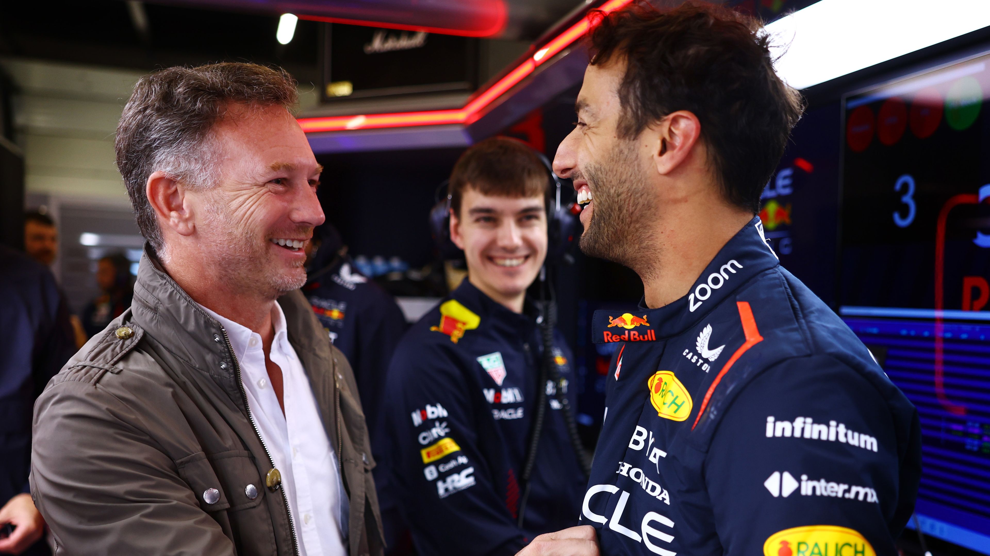 Red Bull team principal Christian Horner (left) with Daniel Ricciardo during the tyre test at Silverstone.