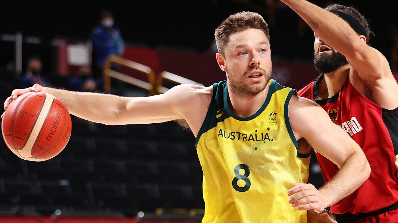 Matthew Dellavedova #8 of Team Australia drives to the basket against Joshiko Saibou #1 of Team Germany during the first half of a Men&#x27;s Basketball Preliminary Round Group B game on day eight of the Tokyo 2020 Olympic Games at Saitama Super Arena on July 31, 2021 in Saitama, Japan. (Photo by Gregory Shamus/Getty Images)