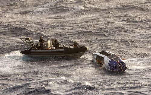 HMAS Choules rescues a solo rowboat adventurer off the east Australian coast.