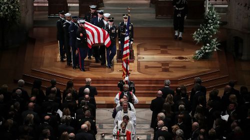 The casket was accompanied by members of his family, and taken by motorcade to St Martin's Episcopal Church.