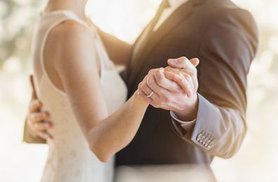 Bride and groom dancing