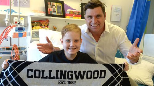 Luke and Hawthorn veteran Shane Crawford. (Supplied)