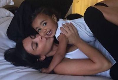 Too cute! Kim Kardashian snuggles with baby North for this adorable Insta-post.