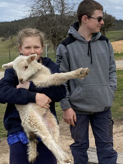 Lydia and Callum on farm