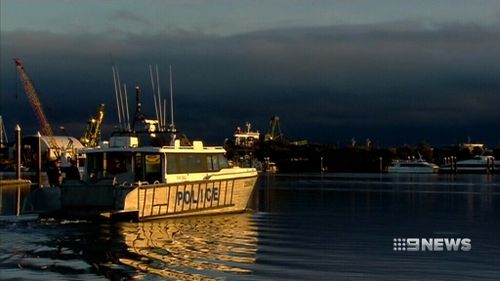 Police entered their second day of scouring the sunken fishing trawler. (9NEWS)