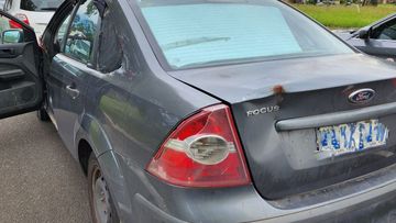 Can you spot the four reasons why this car isn't roadworthy?